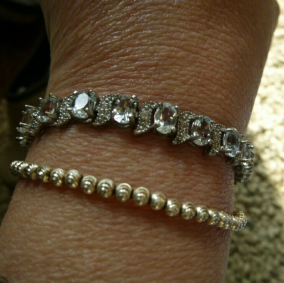 not sure. Jewelry - AQUAMARINE AND DIAMOND BRACELET